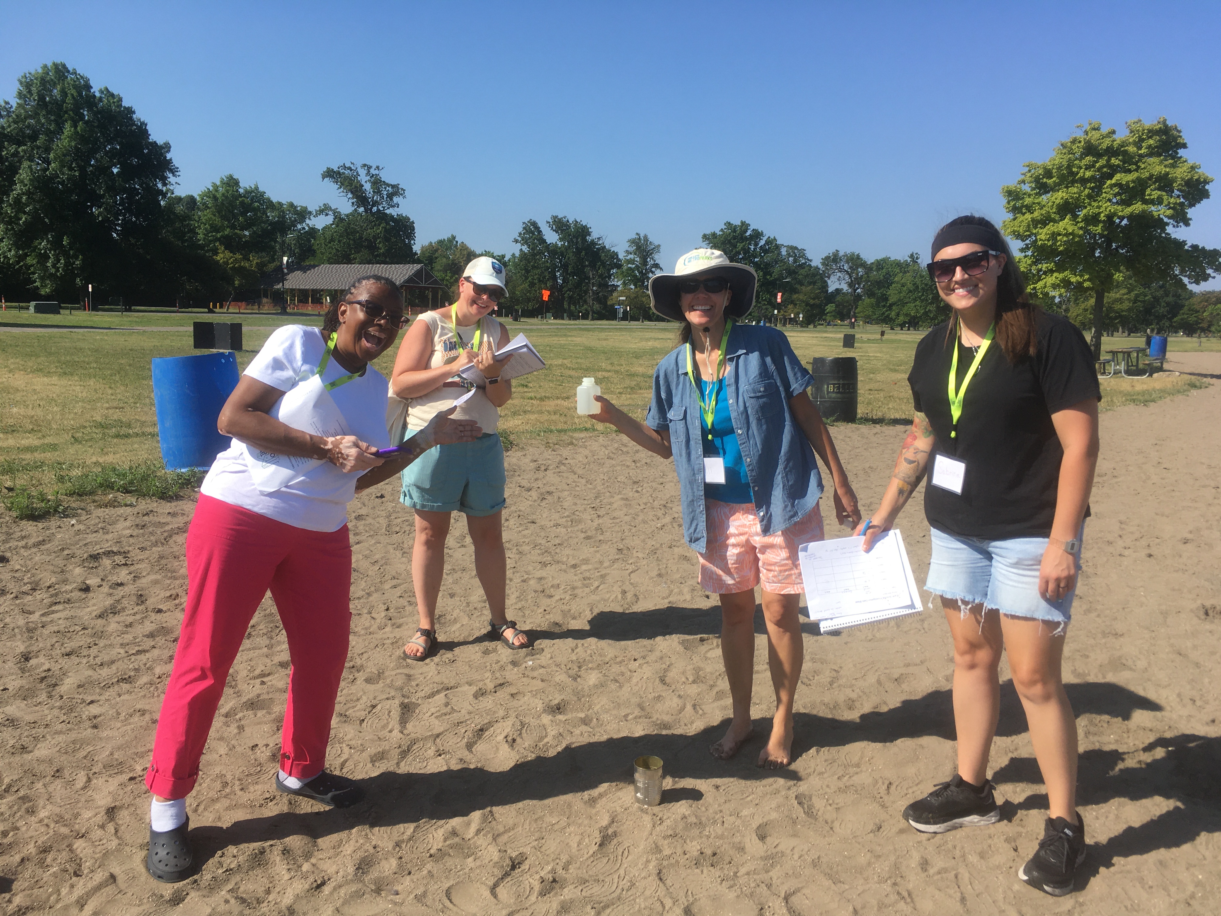 participants sharing Treasure Hunt finds at Belle Isle